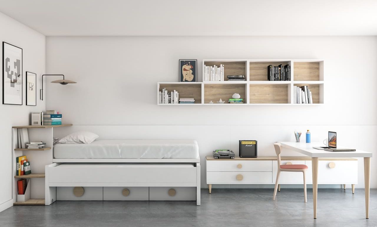 Dormitorio juvenil con camas nido en un espacio muy personal